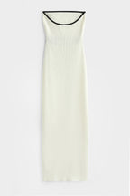 vestido blanco ajustado mujer ribete negro abertura cintura elegante